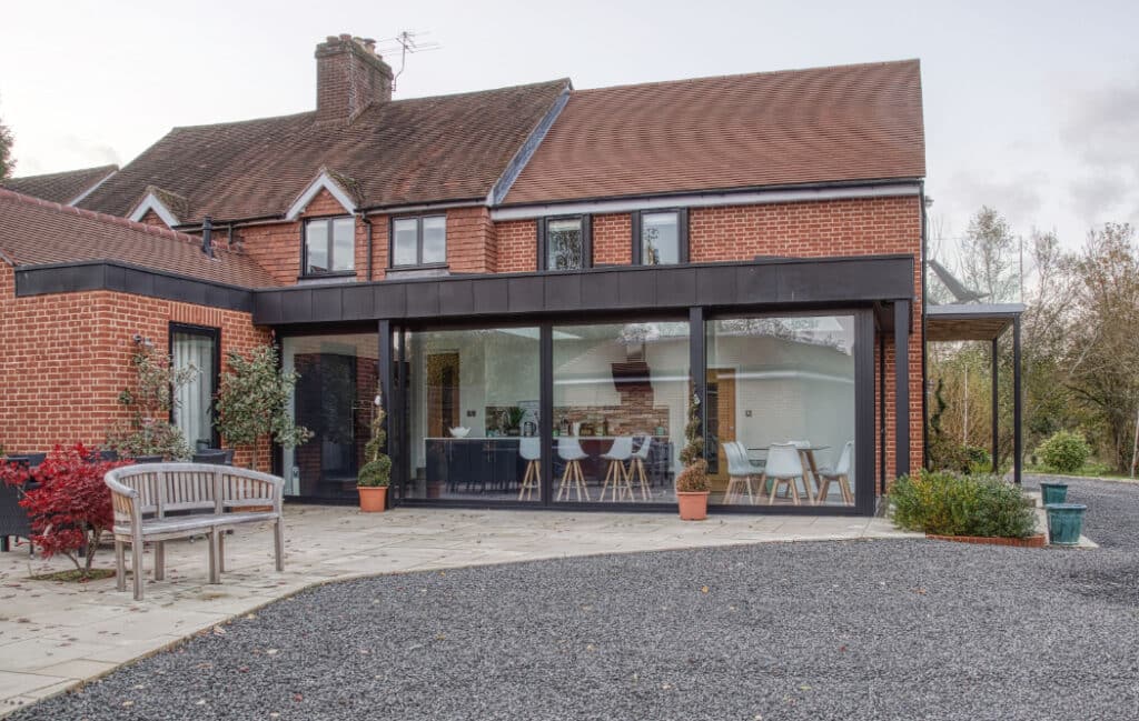 Cheshire red-brick home with zinc clad extension