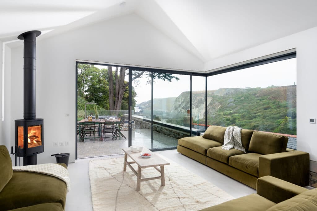 The frameless glass-to-glass corner windows offer panoramic views