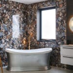 Thumbnail of http://The%20bathroom%20features%20a%20stunning%20wall%20effect
