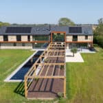 Thumbnail of http://Exterior%20shot%20of%20the%20rear%20of%20the%20Lincolnshire%20Grand%20Designs%20project%20featuring%20SVG20%20sliding%20doors,%20SF75eco%20bifold%20doors,%20aluminium%20windows%20and%20large%20fixed%20frame%20picture%20window