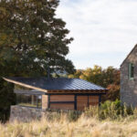 Thumbnail of http://Modern%20pavilion%20with%20bifold%20doors%20and%20metal%20roof%20beside%20traditional%20stone%20cottage%20in%20Scottish%20countryside%20setting.