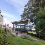 Thumbnail of http://Modern%20glazed%20pavilion%20with%20bifold%20doors%20overlooking%20Scottish%20countryside,%20attached%20to%20traditional%20stone%20house.